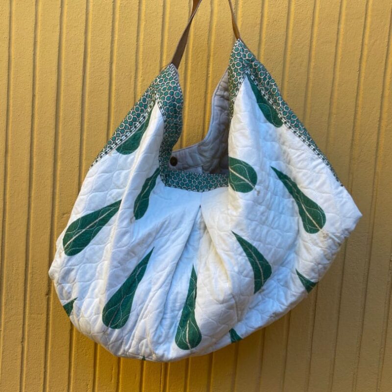 Bolsa de tela abonbada asa de cuero pinos