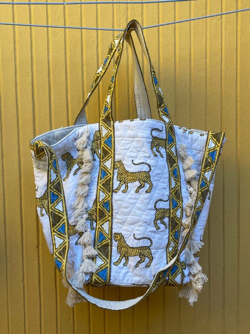 Bolsa de tela con borlas guepardo