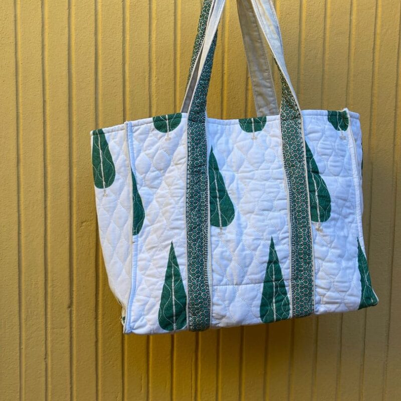 Bolsa de tela acolchada pinos
